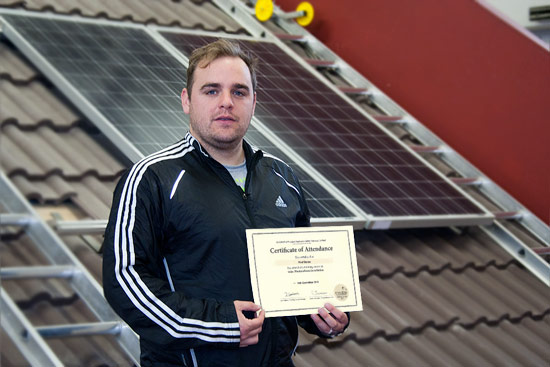 Paul Standing With Certificate